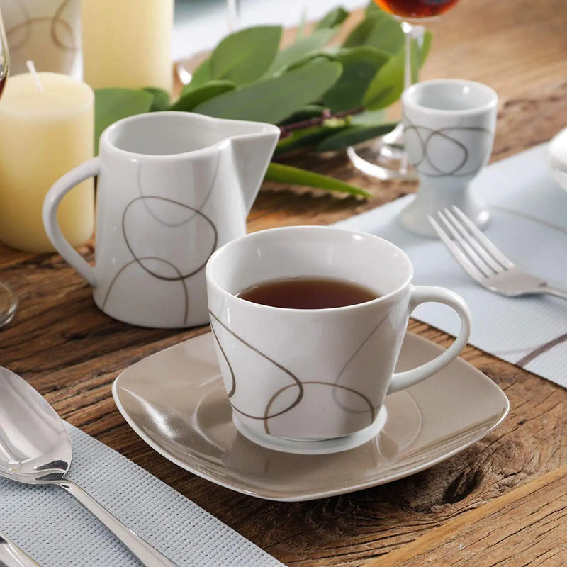 Axya™ 50-Piece Porcelain Dinner Set with Egg Cup, Cup & Saucer, Mugs, Plates, Bowls, Milk Jug, Sugar Pot