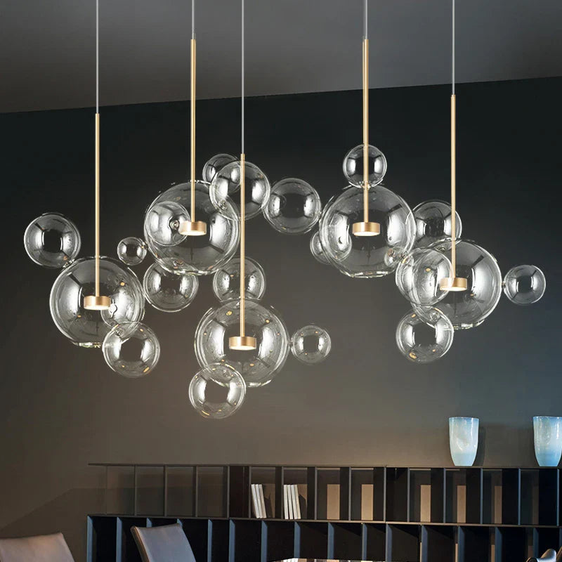 Axyaa Frosted Glass Ball Pendant Light for Modern Dining and Living Spaces.