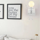 Axyaa Cartoon Doll Wall Sconce: Modern Iron Art Light for Living Kids Room