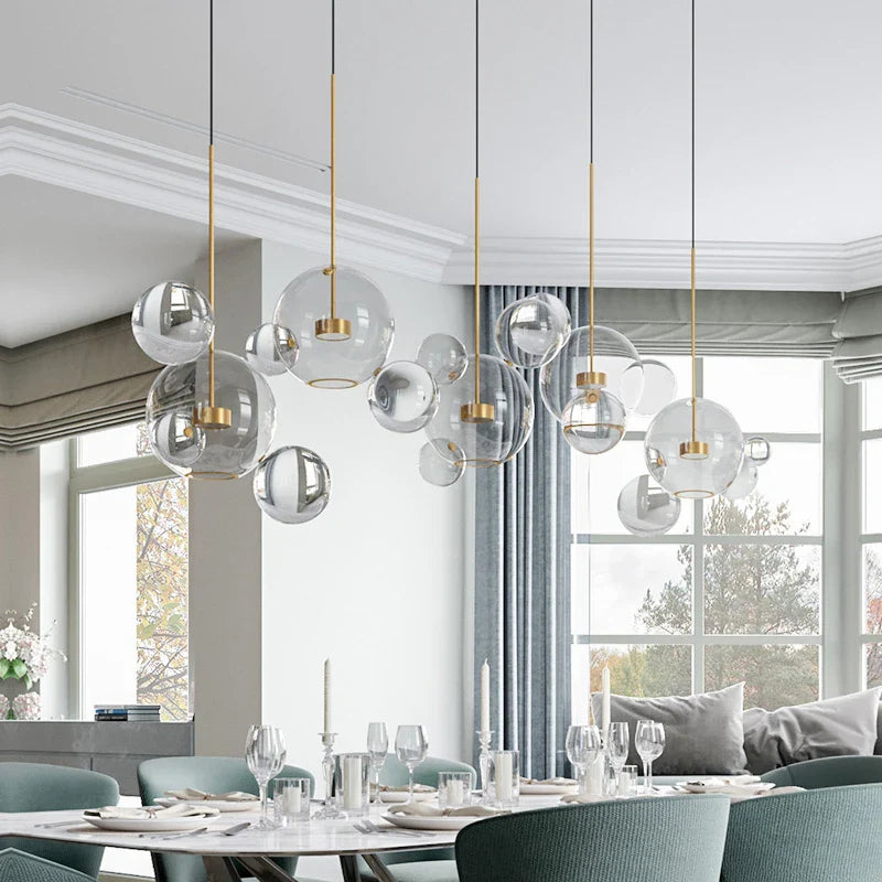 Axyaa Frosted Glass Ball Pendant Light for Modern Dining and Living Spaces.