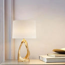 Axyaa Golden Resin Hollow Table Lamp with LED Light, White Cloth Lampshade for Bedroom & Study