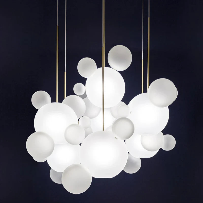 Axyaa Frosted Glass Ball Pendant Light for Modern Dining and Living Spaces.