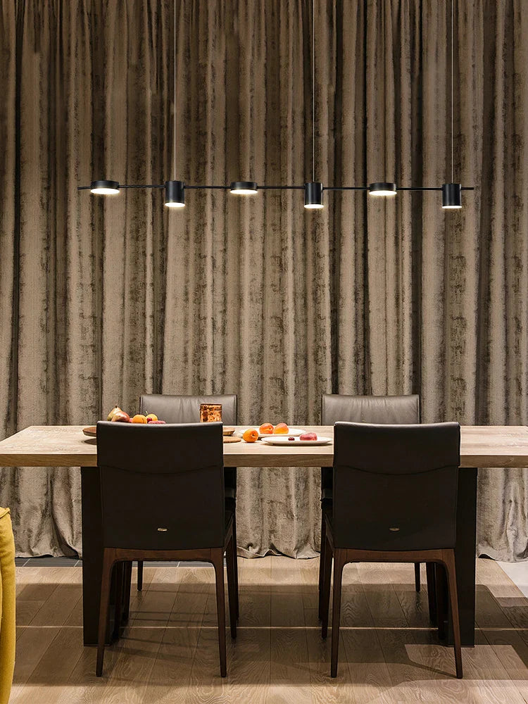 Axya minimalist LED pendant light perfect for dining room, bar, and restaurant tables.