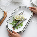 Axya Ceramic Dinnerware Set: Plates, Tray, Bowls - White with Black Edge