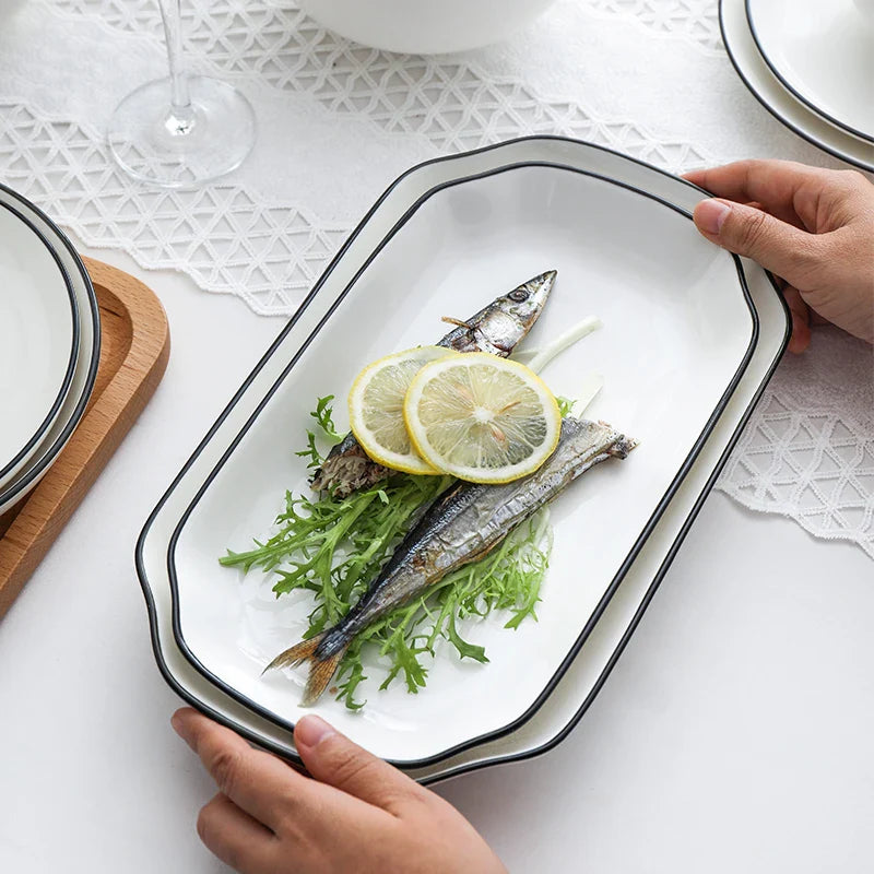 Axya Ceramic Dinnerware Set: Plates, Tray, Bowls - White with Black Edge