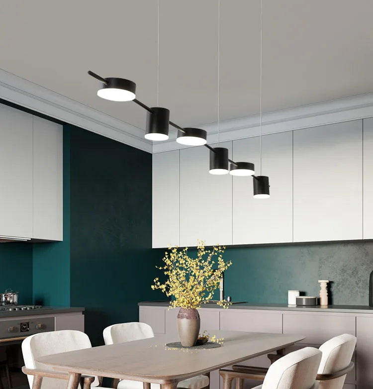 Axya minimalist LED pendant light perfect for dining room, bar, and restaurant tables.