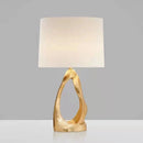 Axyaa Golden Resin Hollow Table Lamp with LED Light, White Cloth Lampshade for Bedroom & Study