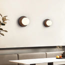 Axyaa White Glass Ball LED Wall Sconce Black Travertine Light Fixture