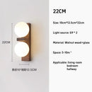Axyaa Black Walnut Retro Wall Lamp for Stylish Living Rooms