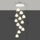 Modern LED pendant lights by Axyaa - staircase chandeliers for stylish indoor living.