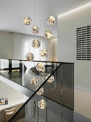 Axyaa Gold Glass Chandelier: Elegant LED Staircase Lighting Solution