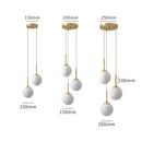 Axyaa Nordic Brass Bedside Pendant Lamp - Modern Glass Sphere for Bedroom & Bar Counter.