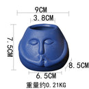 Ceramic Human Face Flowerpot by Axyaa