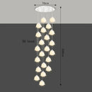 Modern LED pendant lights by Axyaa - staircase chandeliers for stylish indoor living.