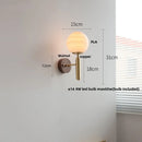 Axyaa Globe White Glass LED Wall Sconce Copper Base Mirror Light