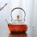 Axyaa 700ml Glass Tea Pot with Metal Handle - Heat Resistant for Electric Ceramic Stove