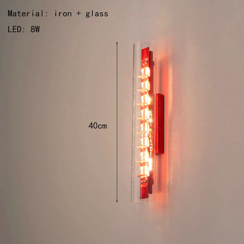 Axyaa Clear Glass Red Metal LED Wall Light for Indoor Spaces