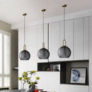 Axyaa Smoke Grey Glass Globe Pendant Light for Industrial Style Living Spaces