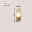 Modern Travertine Stone Wall Sconce Light with Glass Ball for Bedroom Living Room by Axyaa