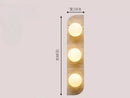 Yellow Cave Stone LED Wall Lamp for Wabi Sabi Ambiance in Bedrooms by Axyaa