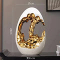 Axyaa Luxury Gold & Silver Egg Decorations: Modern, High-End Décor for Living Rooms & Offices.