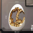 Axyaa Luxury Gold & Silver Egg Decorations: Modern, High-End Décor for Living Rooms & Offices.
