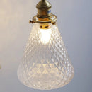 Axyaa Wabi Sabi Clear Glass LED Wall Lamp with Vintage Brass Socket