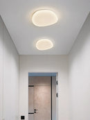 Axya Cobblet Pebble-Sucking Ceiling Light: Simple, Stylish Illumination for Every Space
