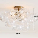 Axyaa Glass Bubble Chandelier: Modern Round Pendant Lamp for Living Room, Kitchen, Hotel.