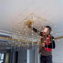 Axyaa Rectangular Cube LED Chandelier: Geometric Stereo Lighting for Hotel Lobby Decoration.