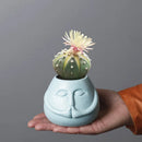 Ceramic Human Face Flowerpot by Axyaa