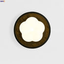 Axyaa White Flower LED Wall Sconce, Vintage Black Travertine Living Lights