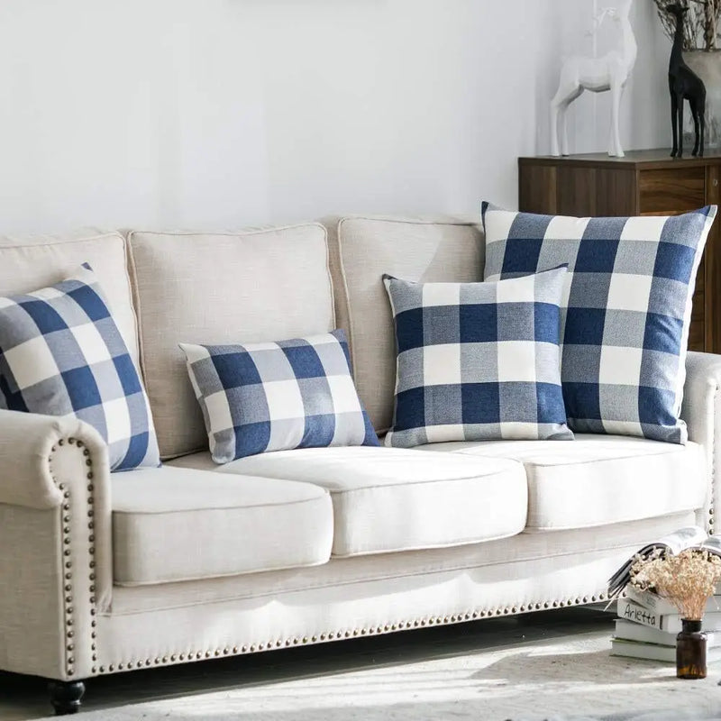 Axyaa Buffalo Plaid Check Throw Pillow Covers in Blue White Orange Ivory.