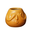 Ceramic Human Face Flowerpot by Axyaa