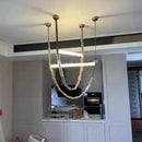 Axyaa Minimalist Belt LED Pendant Chandelier: Italian Design, Modern Style, Ideal for Living Room & Bar.