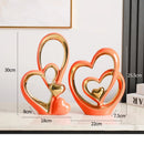 Axyaa Gold Ceramic Ornaments for Stylish Home Decor - Set of 2