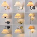Axya Curved Metal LED Wall Lamp with Pleated Lampshade