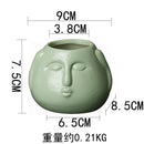 Ceramic Human Face Flowerpot by Axyaa