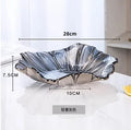 Axyaa Melon Seed & Fruit Plate Set on Crystal Glass Coffee Table