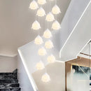 Modern LED pendant lights by Axyaa - staircase chandeliers for stylish indoor living.