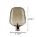 Axyaa Modern Glass Desk Lamp for Minimalist Style and Elegant Living Spaces.
