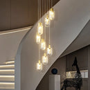 Axyaa Modern Crystal Stair Chandelier - Rotating Long Design for Luxe Penthouse