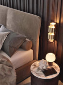 Axyaa Stainless Steel LED Wall Lamp for Luxury Hotel Room Decoration.