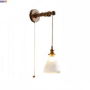 Axyaa Wabi Sabi Clear Glass LED Wall Lamp with Vintage Brass Socket