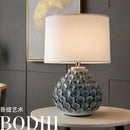 Axyaa Blue Ceramic Desk Lamp with White Fabric Shade for Modern Minimalist Home Decor