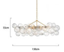 Axyaa Glass Bubble Chandelier: Modern Round Pendant Lamp for Living Room, Kitchen, Hotel.