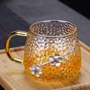 Axyaa Clear Glass Tea Cups with Yellow Handle and Tin Flower Decoration
