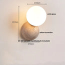 Axyaa Modern LED Stone Wall Light Fixture White Glass Globe Yellow Travertine