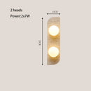 Modern Travertine Stone Wall Sconce Light with Glass Ball for Bedroom Living Room by Axyaa