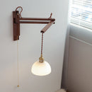 Axyaa Vintage Brass LED Wall Lamp with Amber Glass, Rotating Design